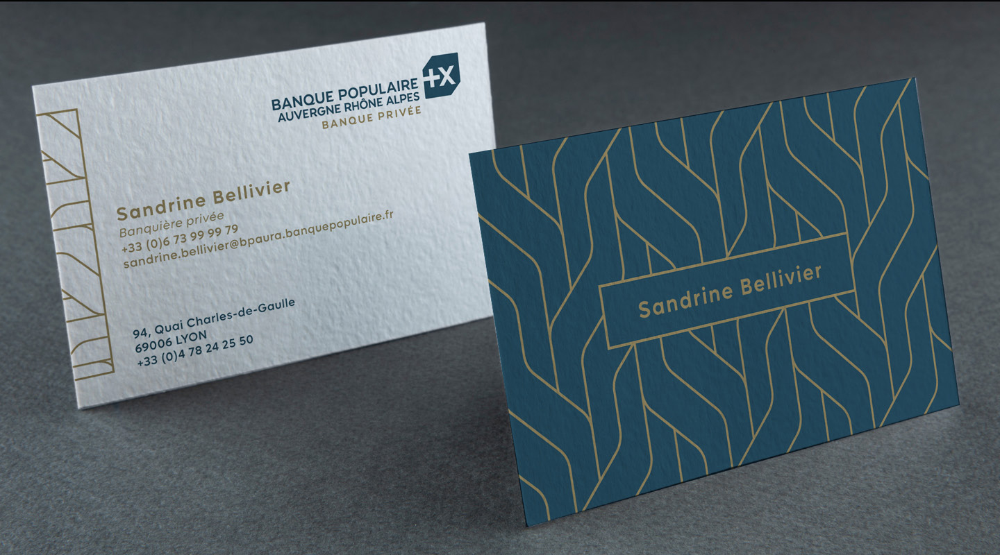 Cartes de visites et papeterie mis aux couleurs de la charte graphique de la Banque